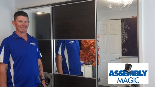 Technician - Brendan, with a flat pack wardrobe he assembled.
