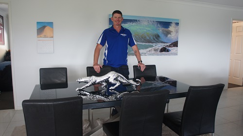 Technician - Brendan, with a dining suite flat pack he completed