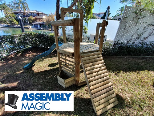 Small Playground installed by Assembly Magic. Logo in bottom right corner