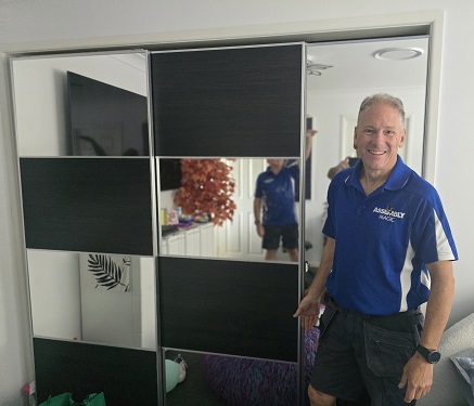Technician - Robert with a wardrobe he assembled