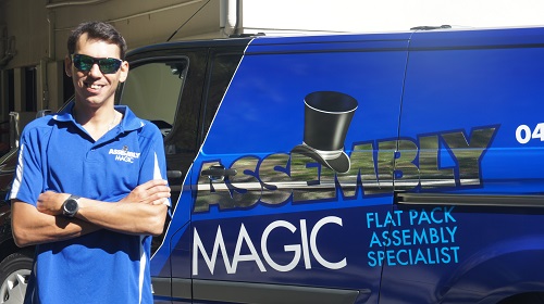 Technician in front of his van