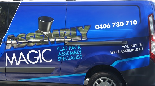 Side of technician - Shaun's Assembly Magic van