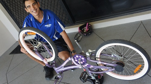 Technician - Shaun with a bike he assembled