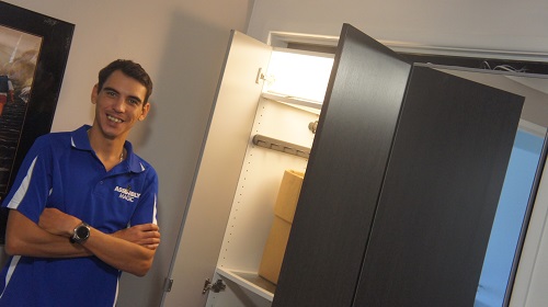 Technician - Shaun in front of a flat pack wardrobe