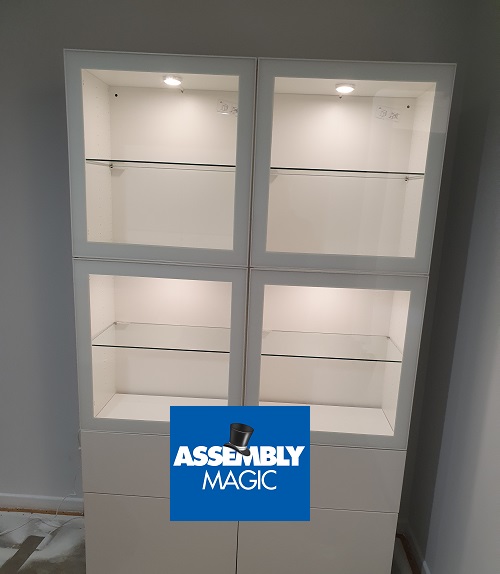 A display cabinet with furniture lighting by Assembly Magic.