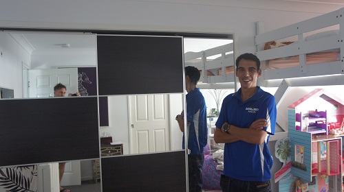 Technician - Shaun in front of a wardrobe he assembled