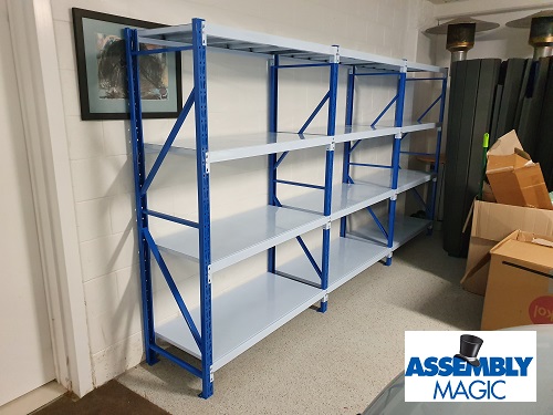 Large metal shelving rack. Assembly Magic logo in bottom right corner