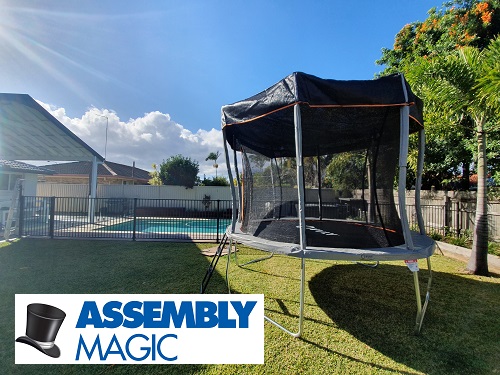 Trampoline with netting and shade cover, assembled by Ben - Assembly Magic