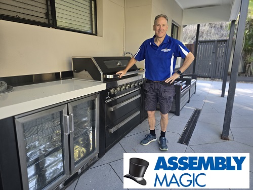 Ben with a complete BBQ kitchen he assembled.